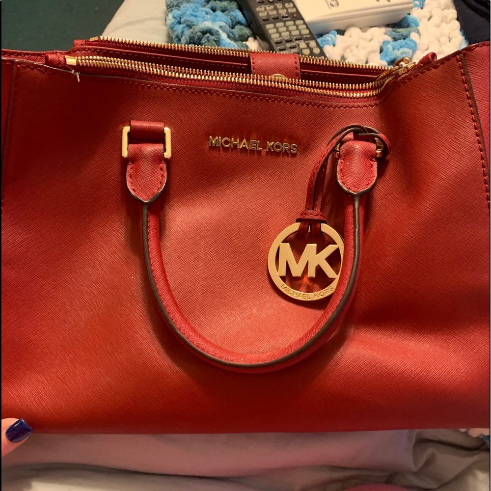 Beautiful red Michael Kors purse great condition